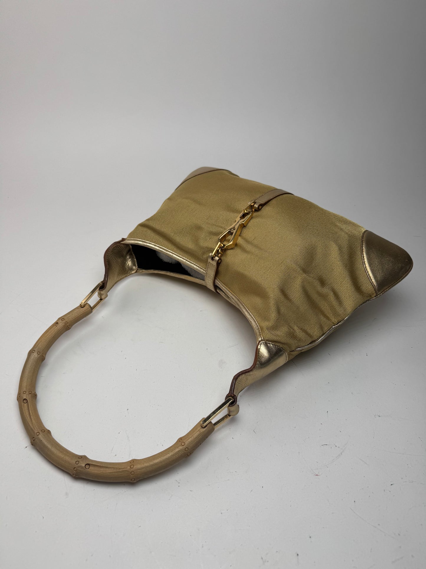 Sac Jackie vintage en cuir et toile Gucci doré