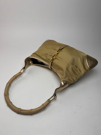 Sac Jackie vintage en cuir et toile Gucci doré