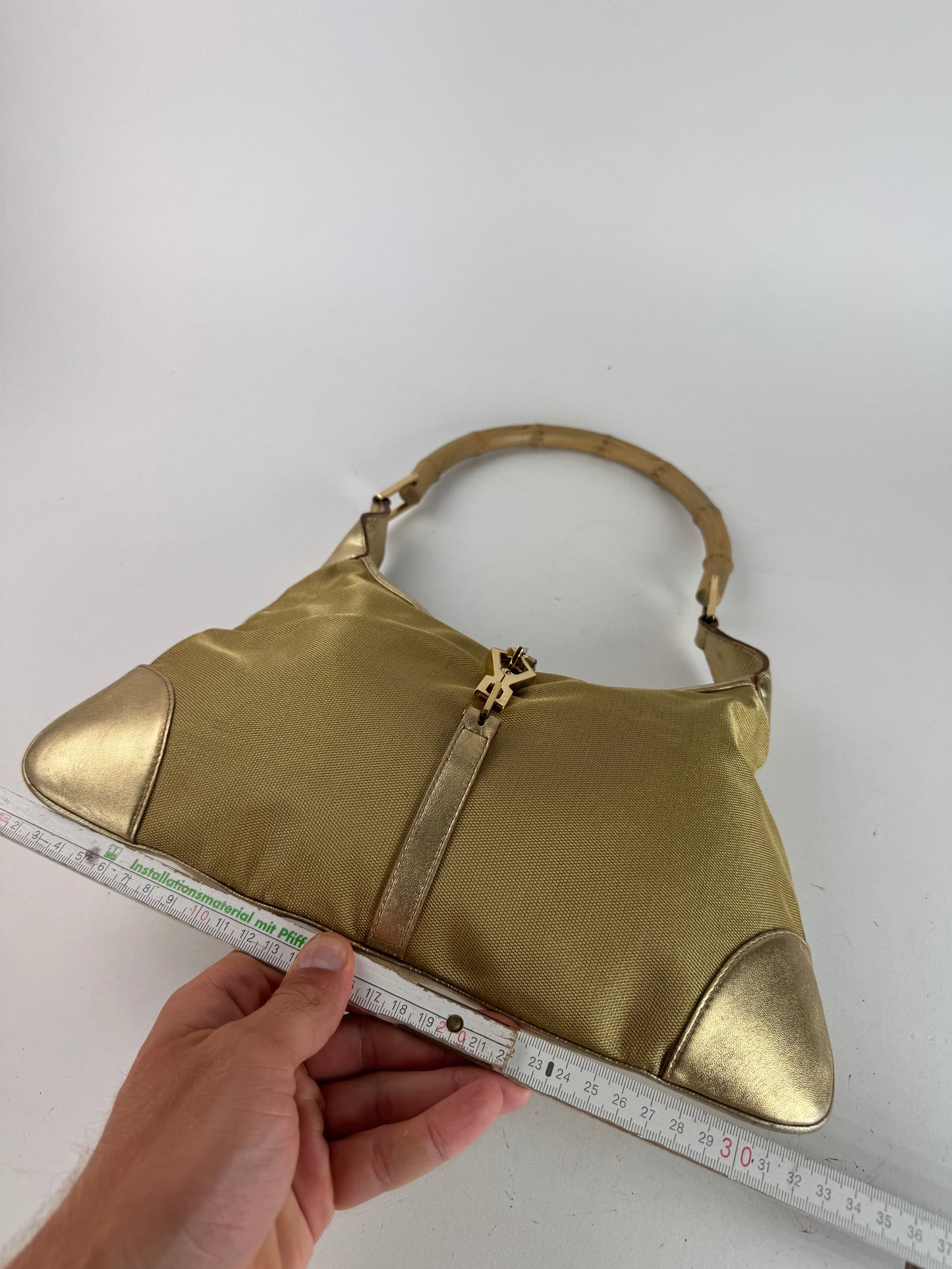 Sac Jackie vintage en cuir et toile Gucci doré