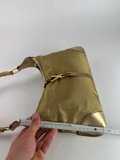 Sac Jackie vintage en cuir et toile Gucci doré