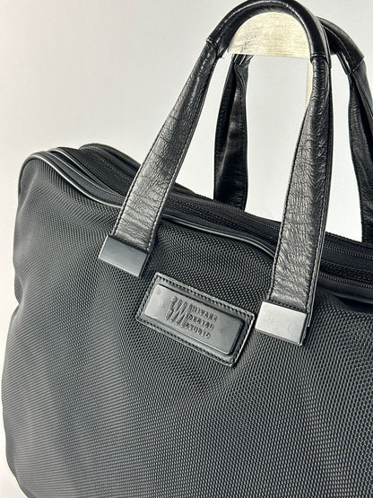 Sac de voyage vintage en cuir vegan Issey Miyake noir