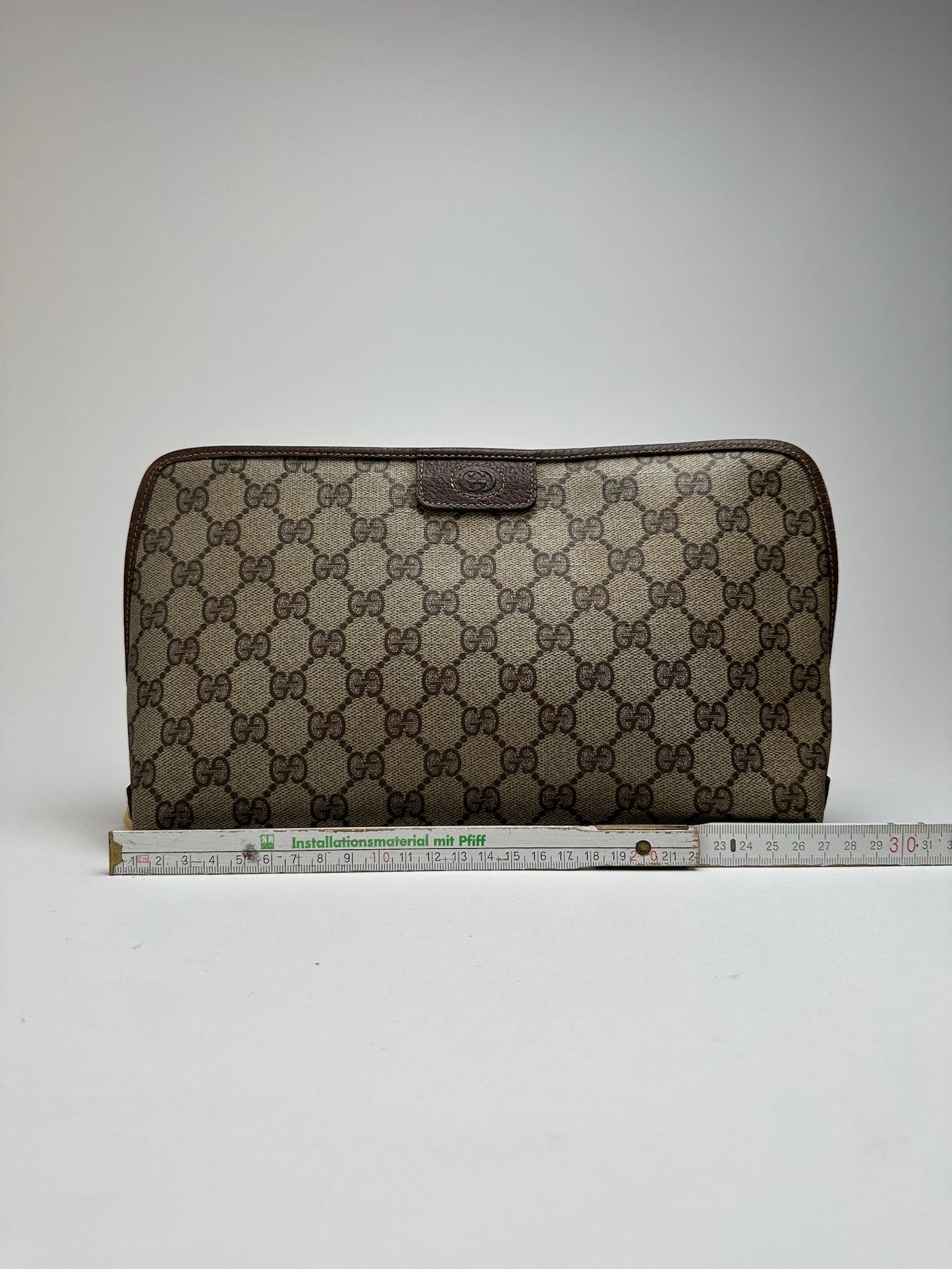 Pochette vintage en cuir monogramme Gucci marron beige