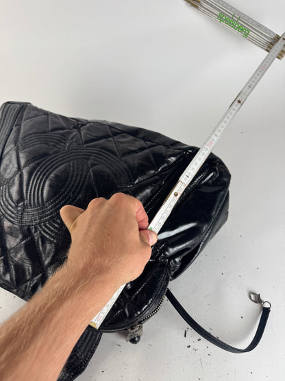 Sac Chanel vintage en cuir verni noir