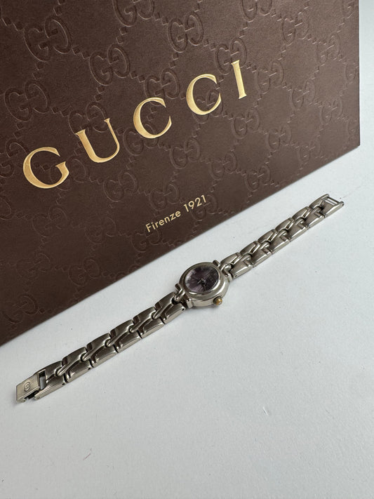 Montre Gucci vintage en acier argenté