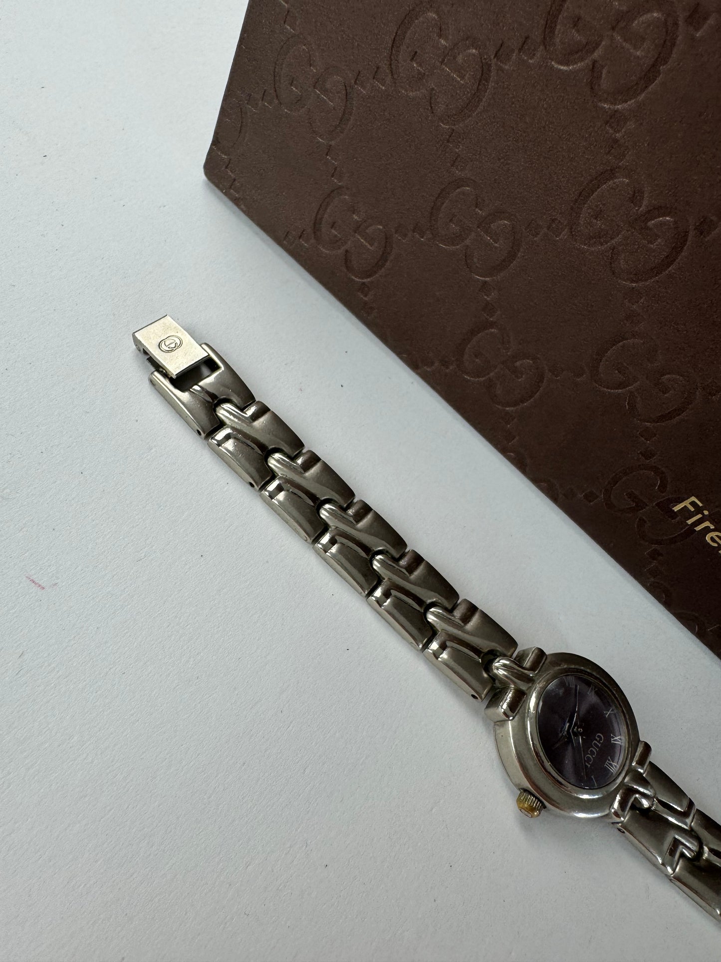 Montre Gucci vintage en acier argenté