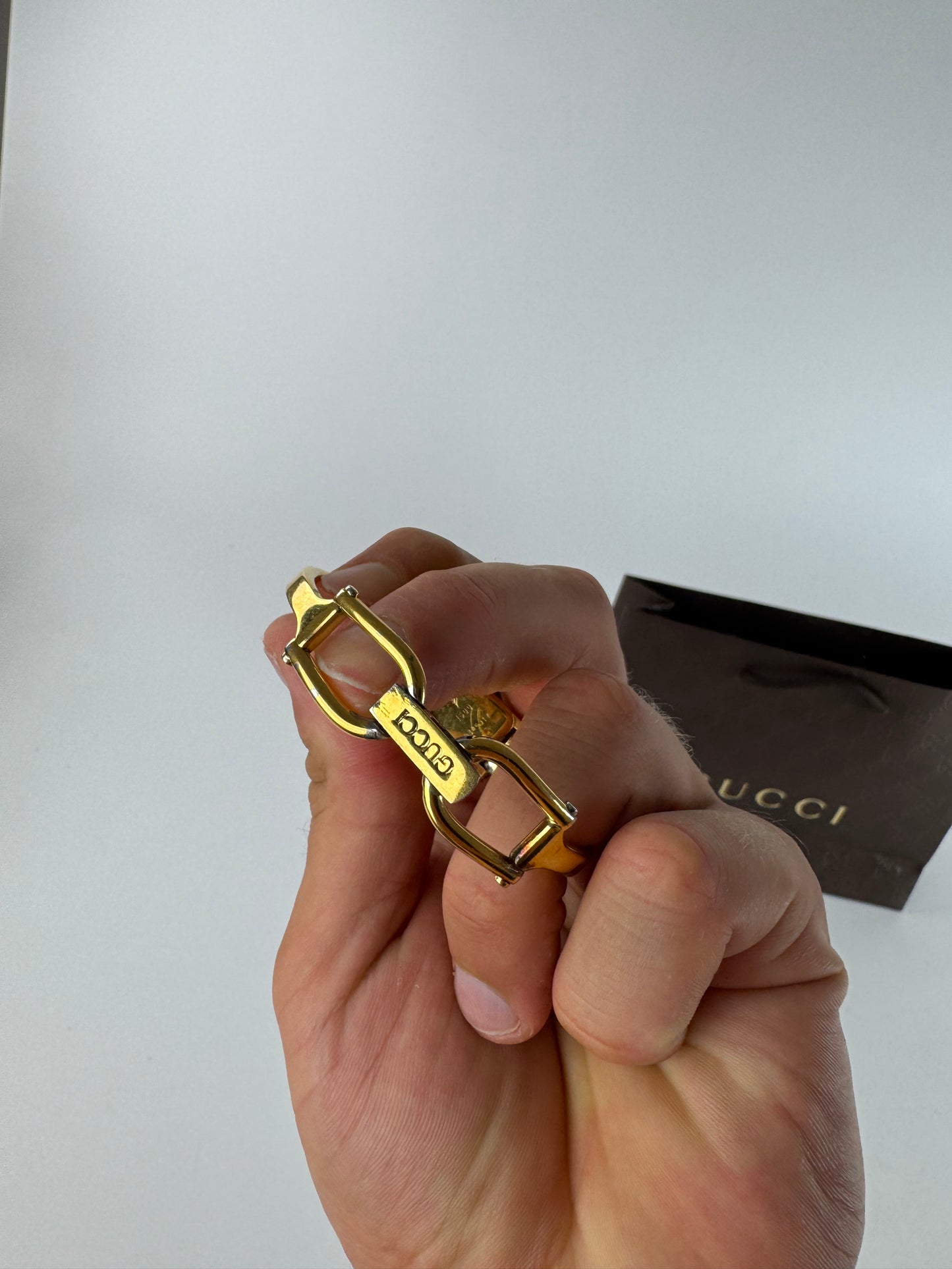 Montre Gucci vintage en acier et or avec mors