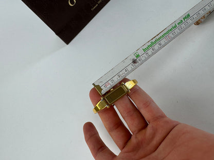 Montre Gucci vintage en acier et or avec mors