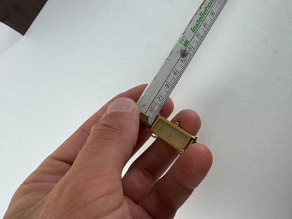 Montre Gucci vintage en acier et or avec mors