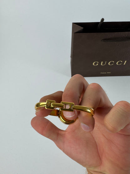 Montre Gucci vintage à mors doré