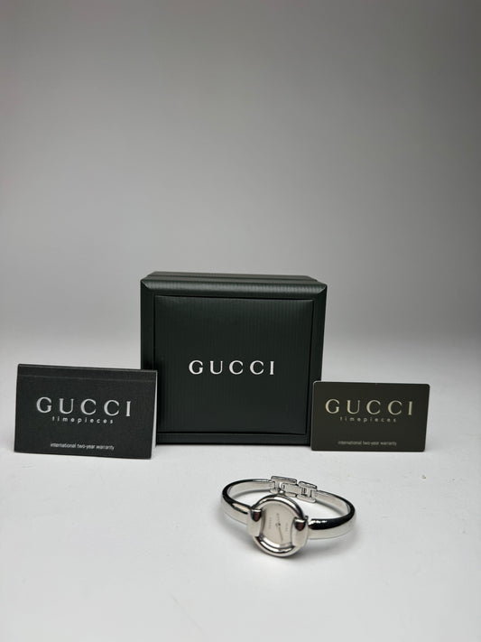 Montre Gucci vintage en acier avec mors argenté, ensemble complet