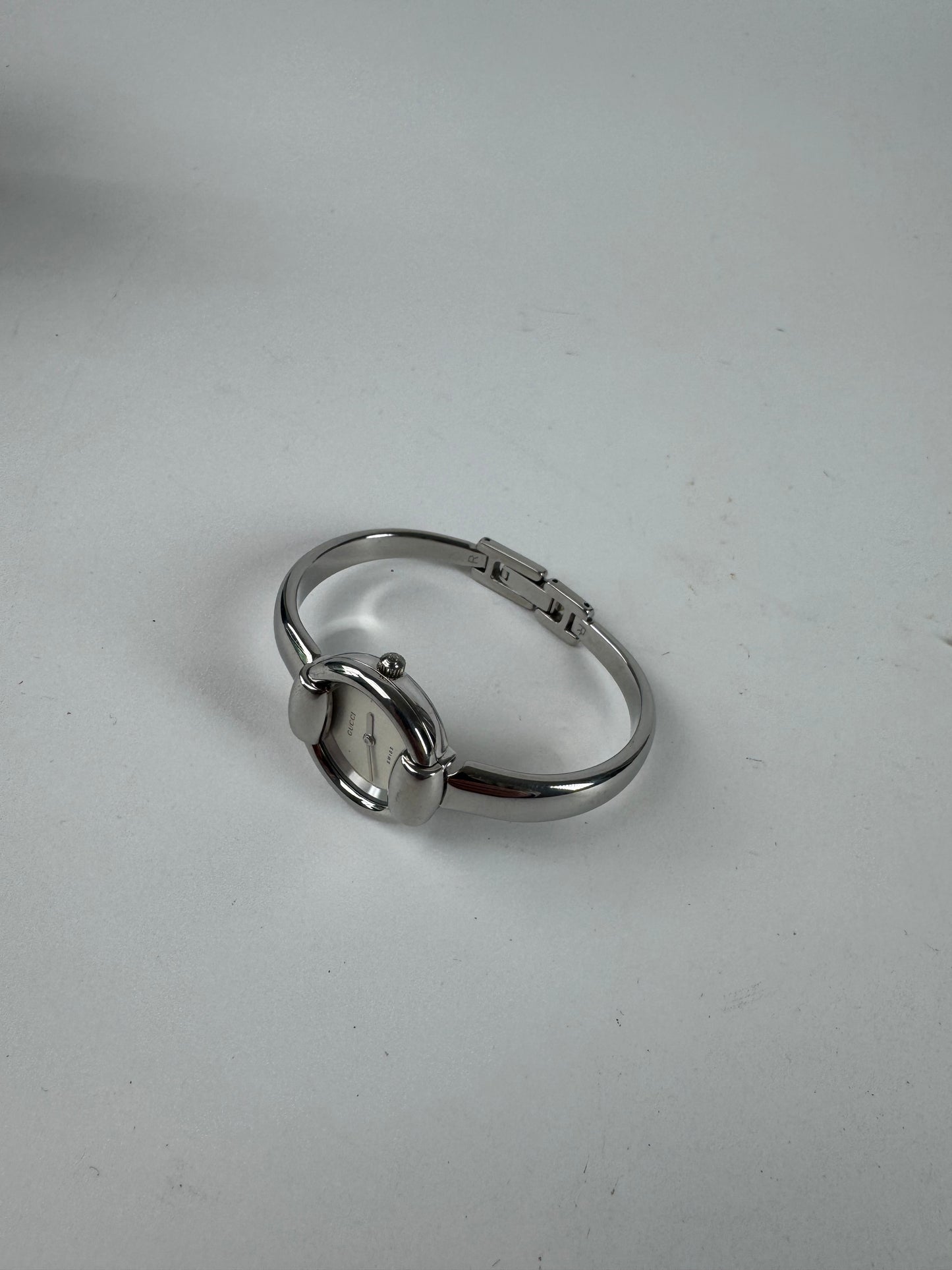 Montre Gucci vintage en acier avec mors argenté, ensemble complet