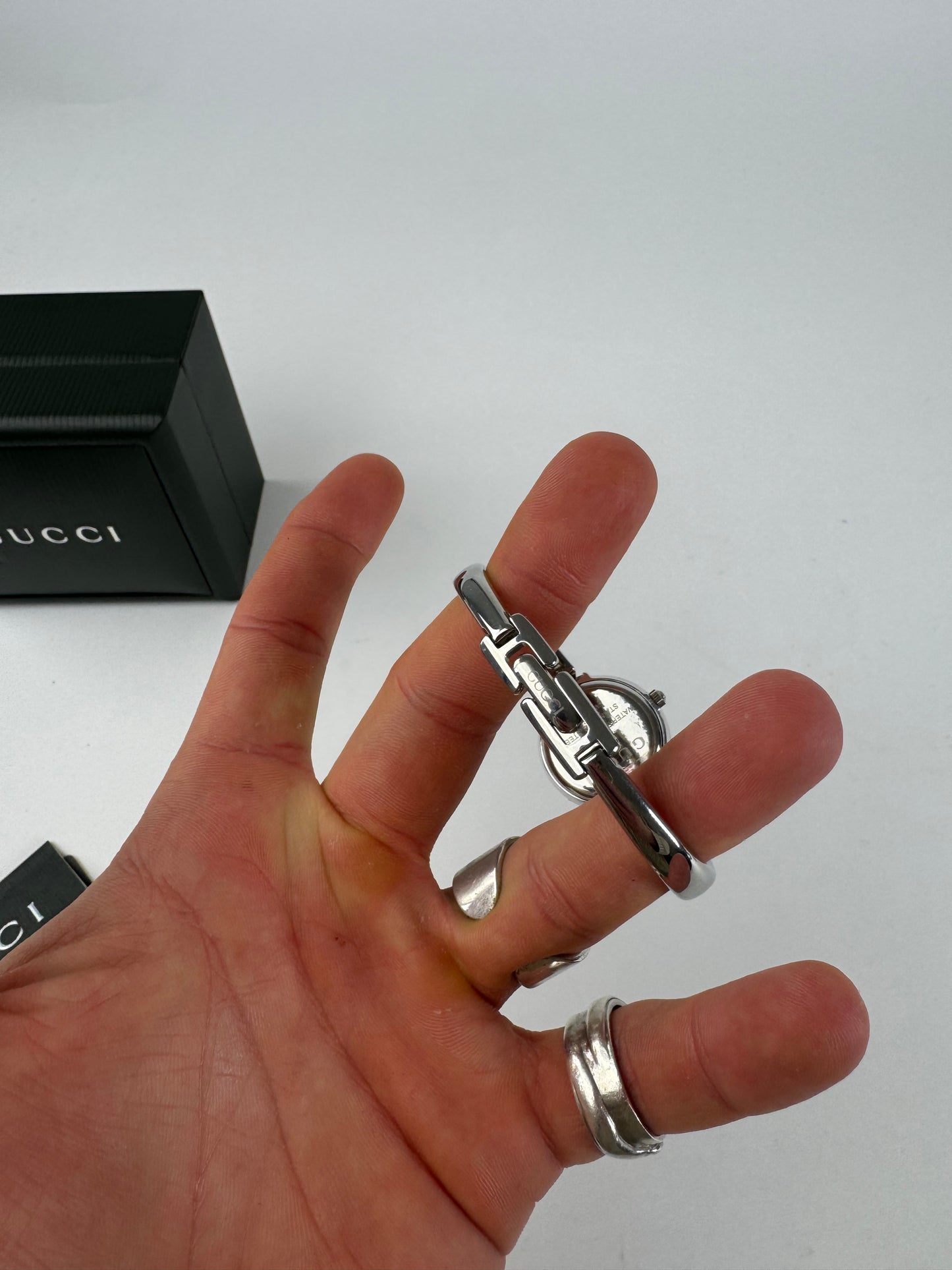 Montre Gucci vintage en acier avec mors argenté, ensemble complet