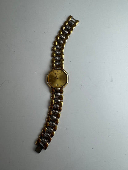 Montre Dior vintage en acier doré