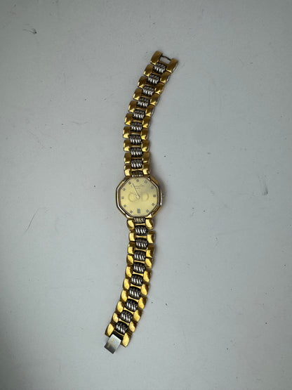 Montre Dior vintage en acier doré