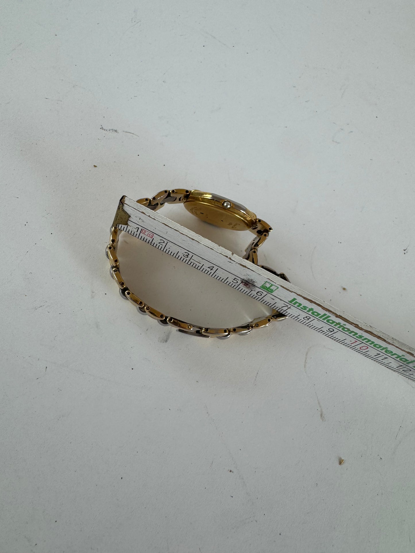 Montre Dior vintage en acier doré