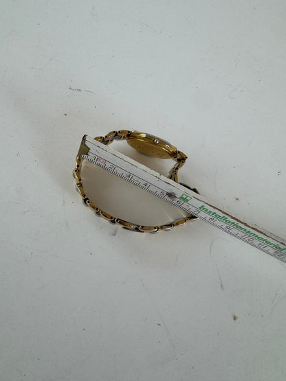 Montre Dior vintage en acier doré