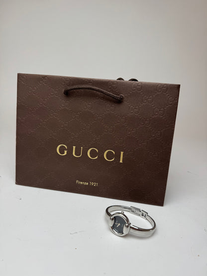 Montre Gucci vintage en métal avec mors argenté