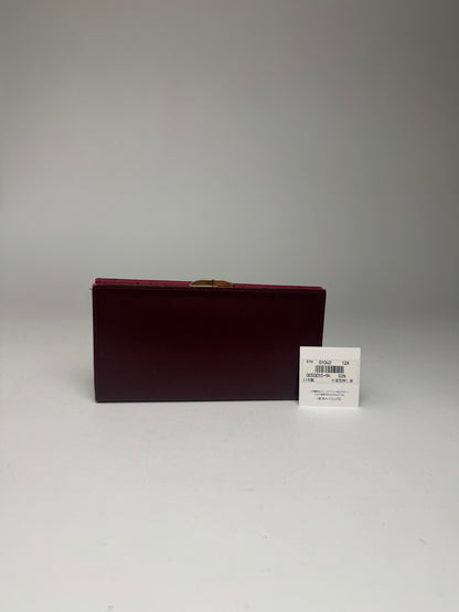 Vintage Givenchy Ostrich Leather wallet purple