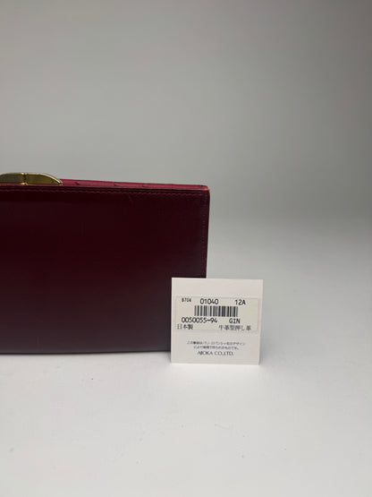 Vintage Givenchy Ostrich Leather wallet purple