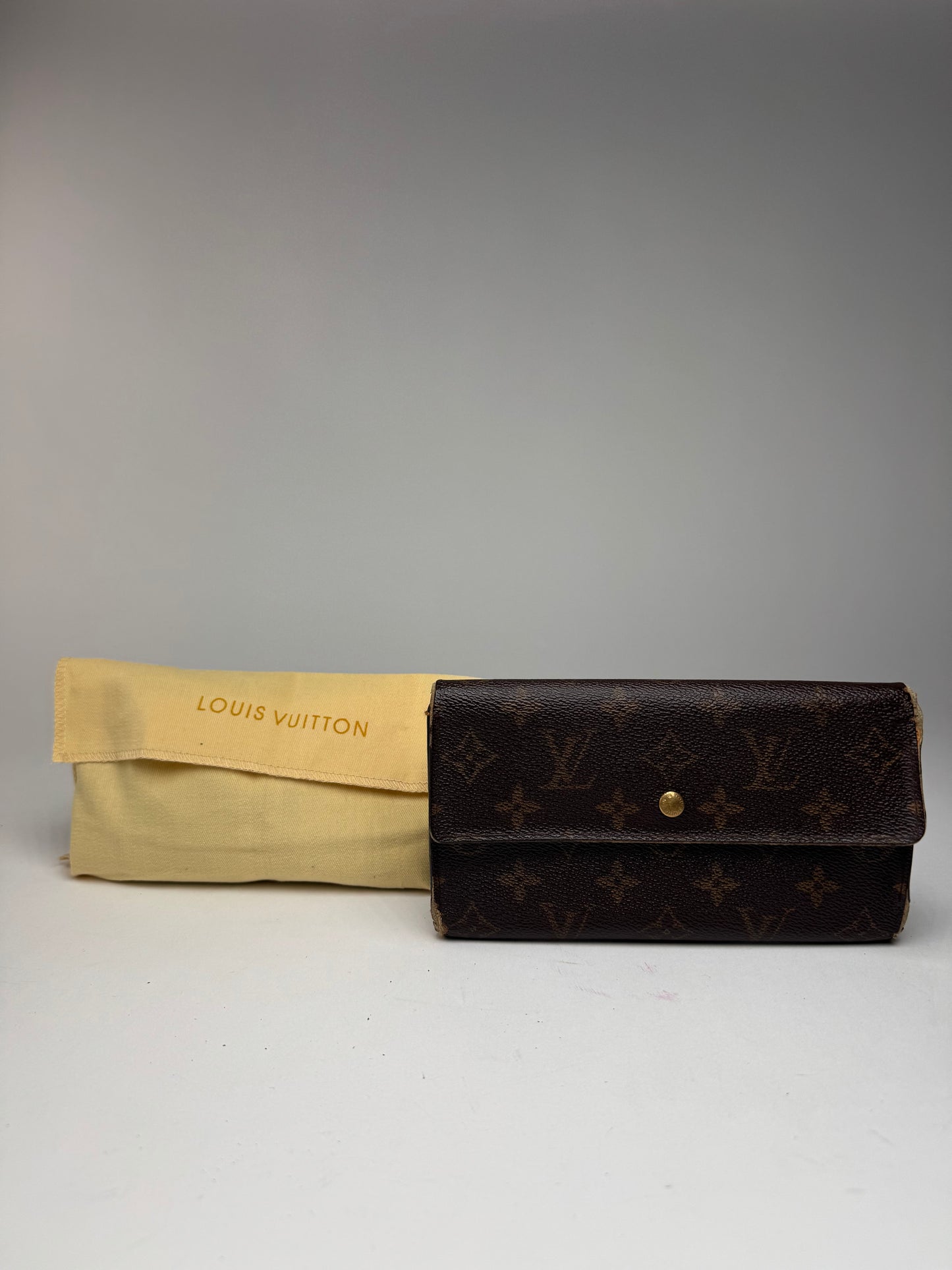 Vintage Louis Vuitton leather monogram wallet brown