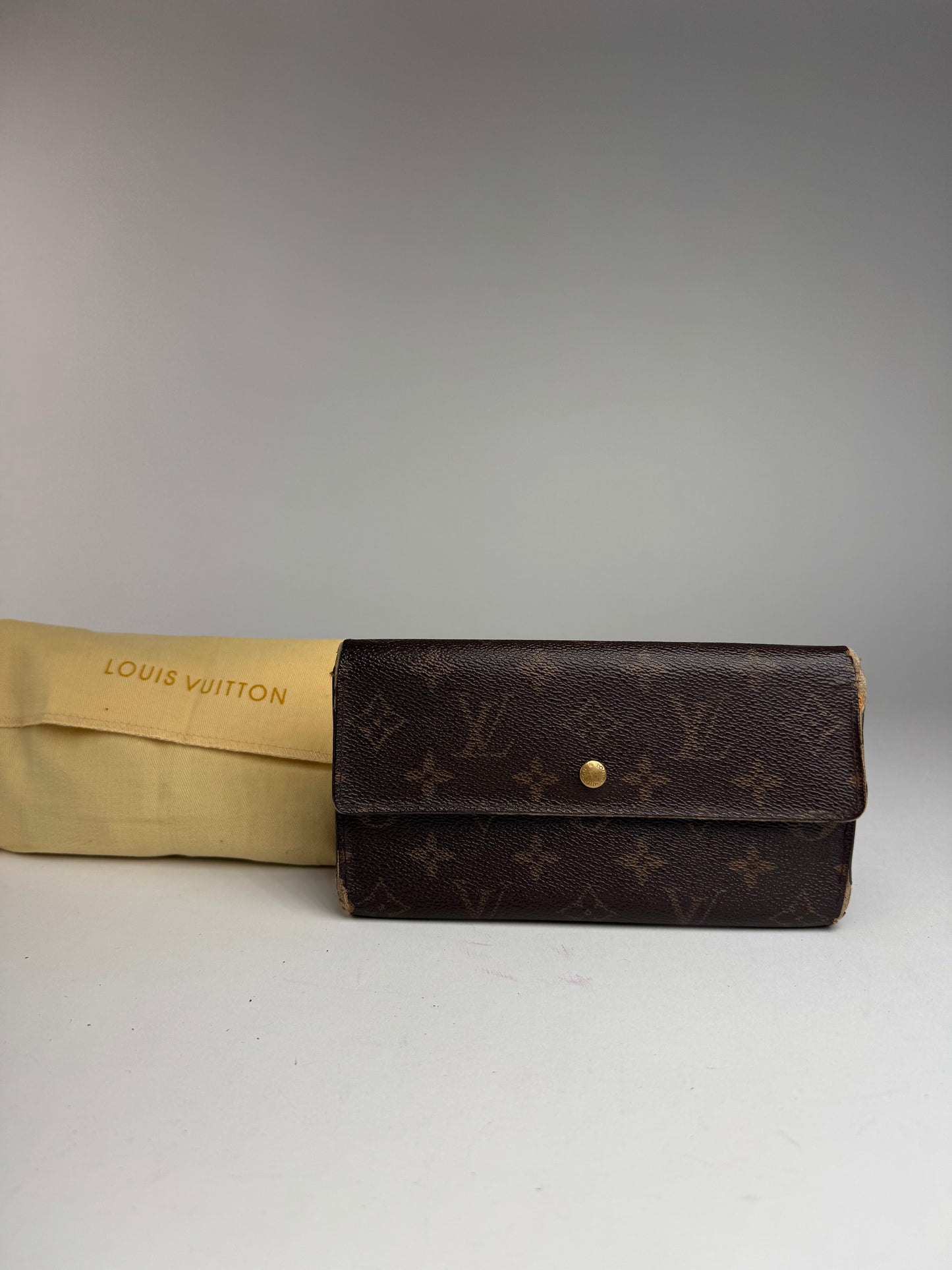 Vintage Louis Vuitton leather monogram wallet brown