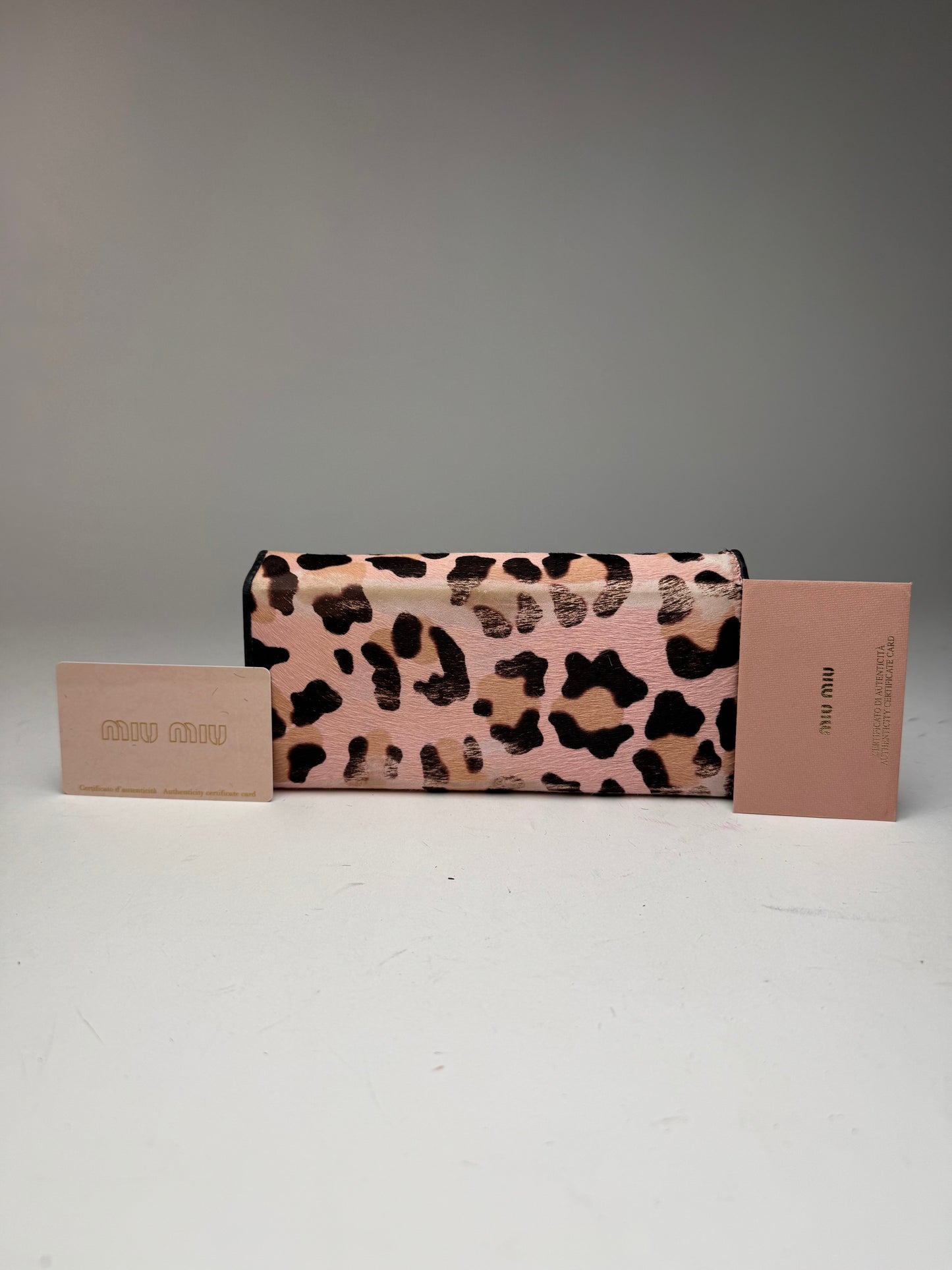 Portefeuille vintage en cuir fourrure Miu Miu noir rose