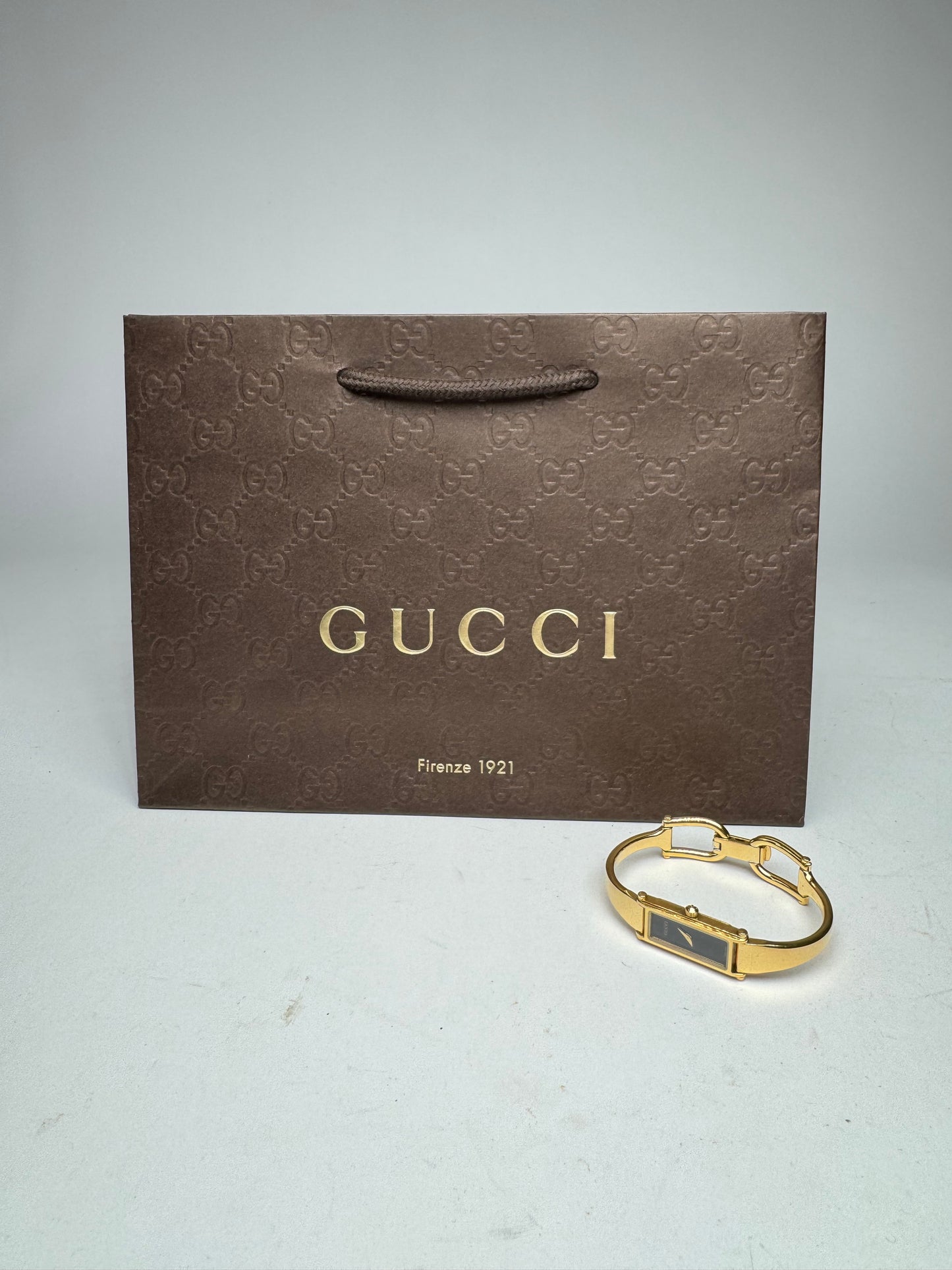 Montre Gucci vintage à mors en or