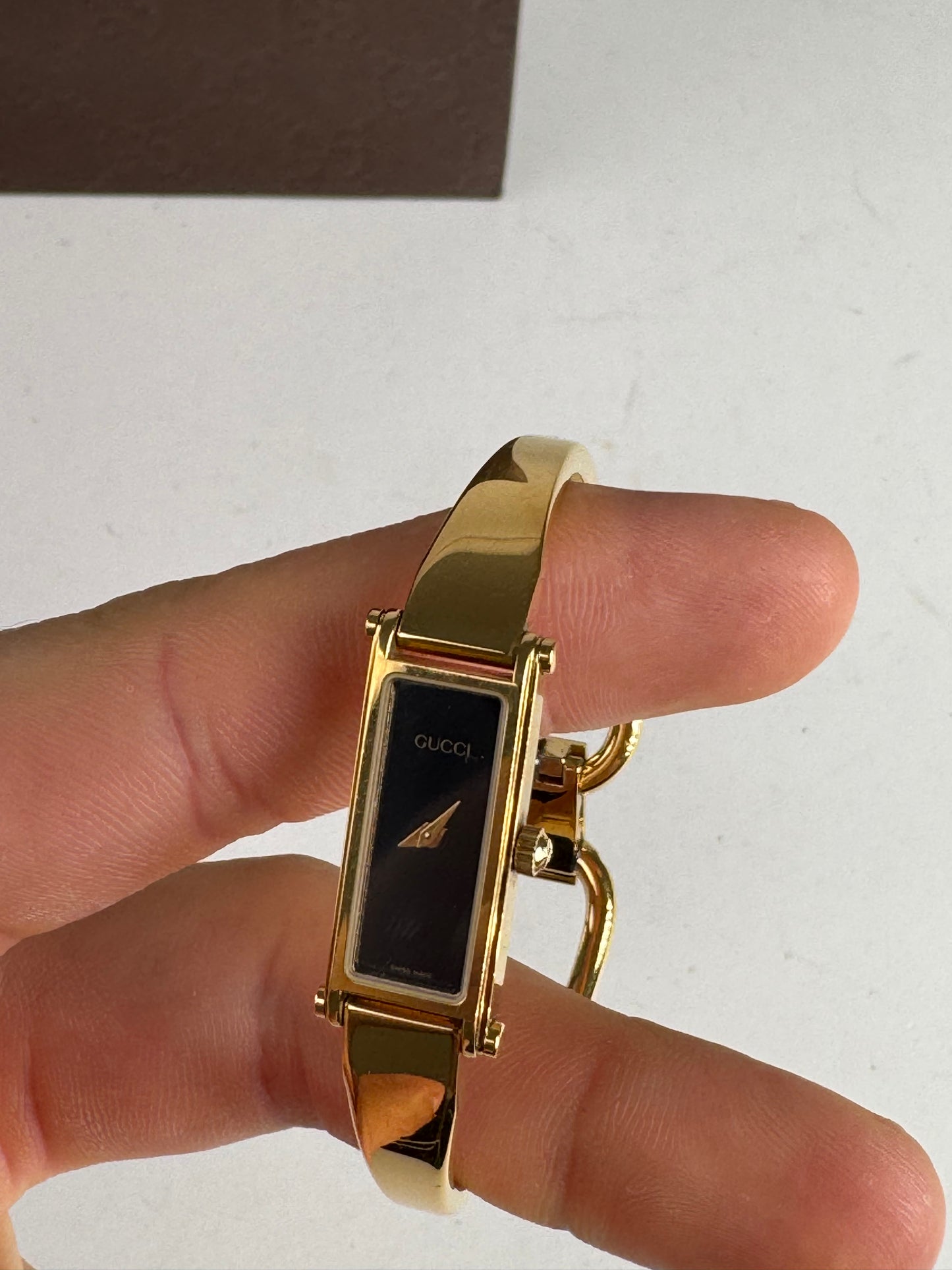 Montre Gucci vintage à mors en or