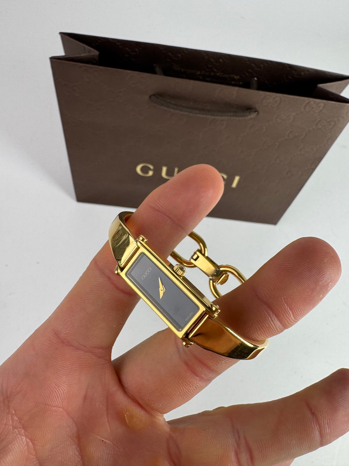 Montre Gucci vintage à mors en or