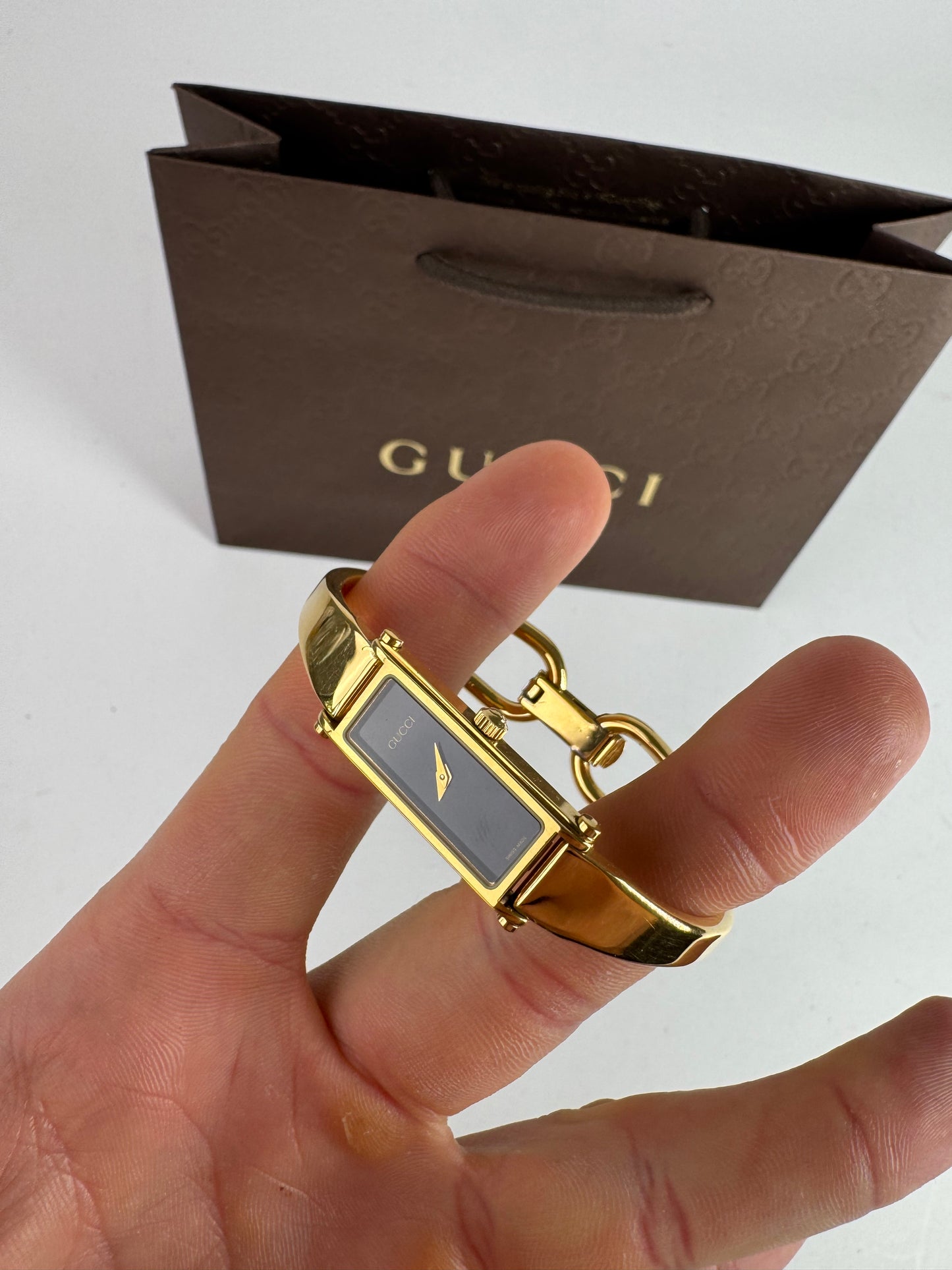 Montre Gucci vintage à mors en or