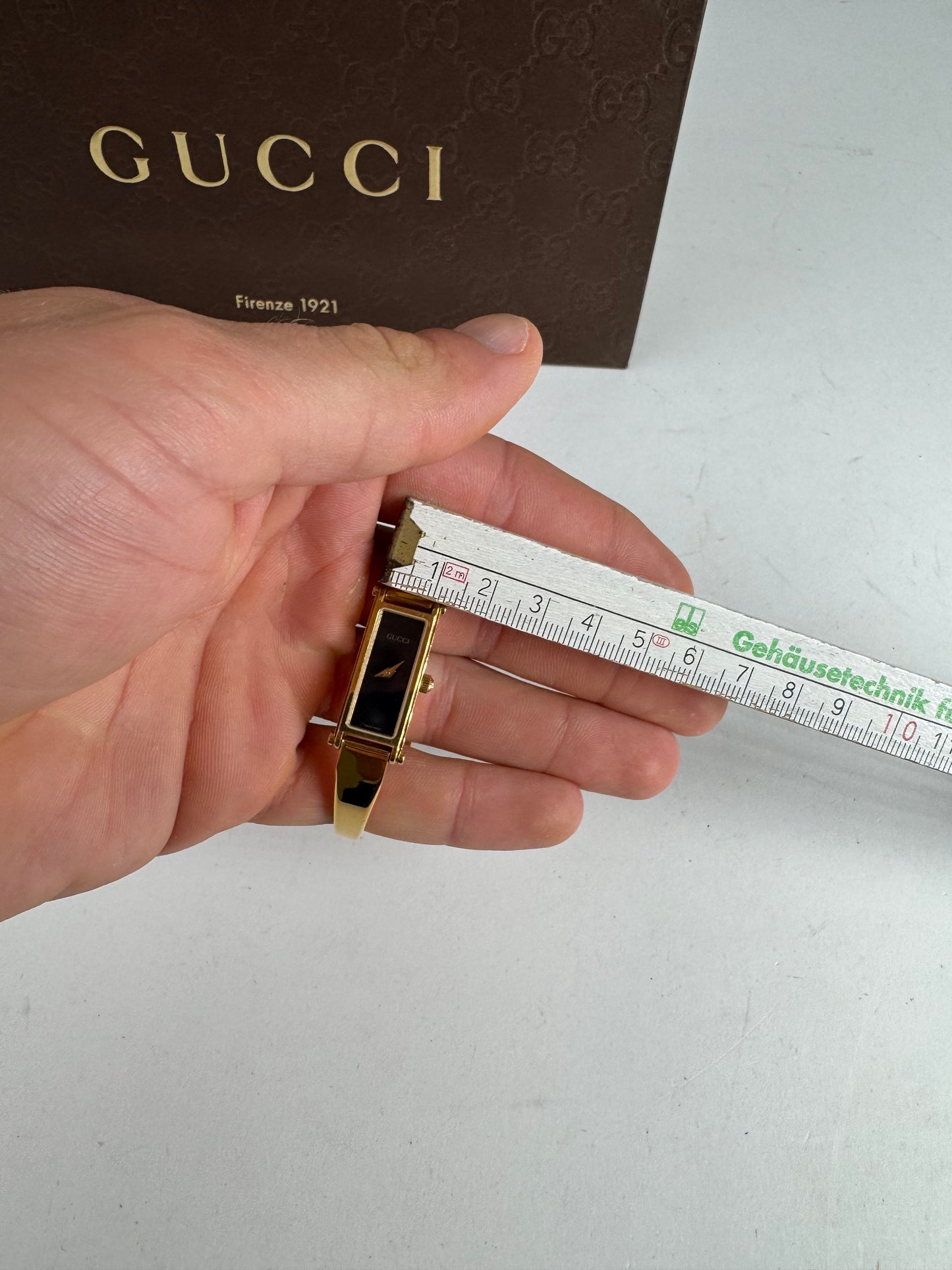 Montre Gucci vintage à mors en or