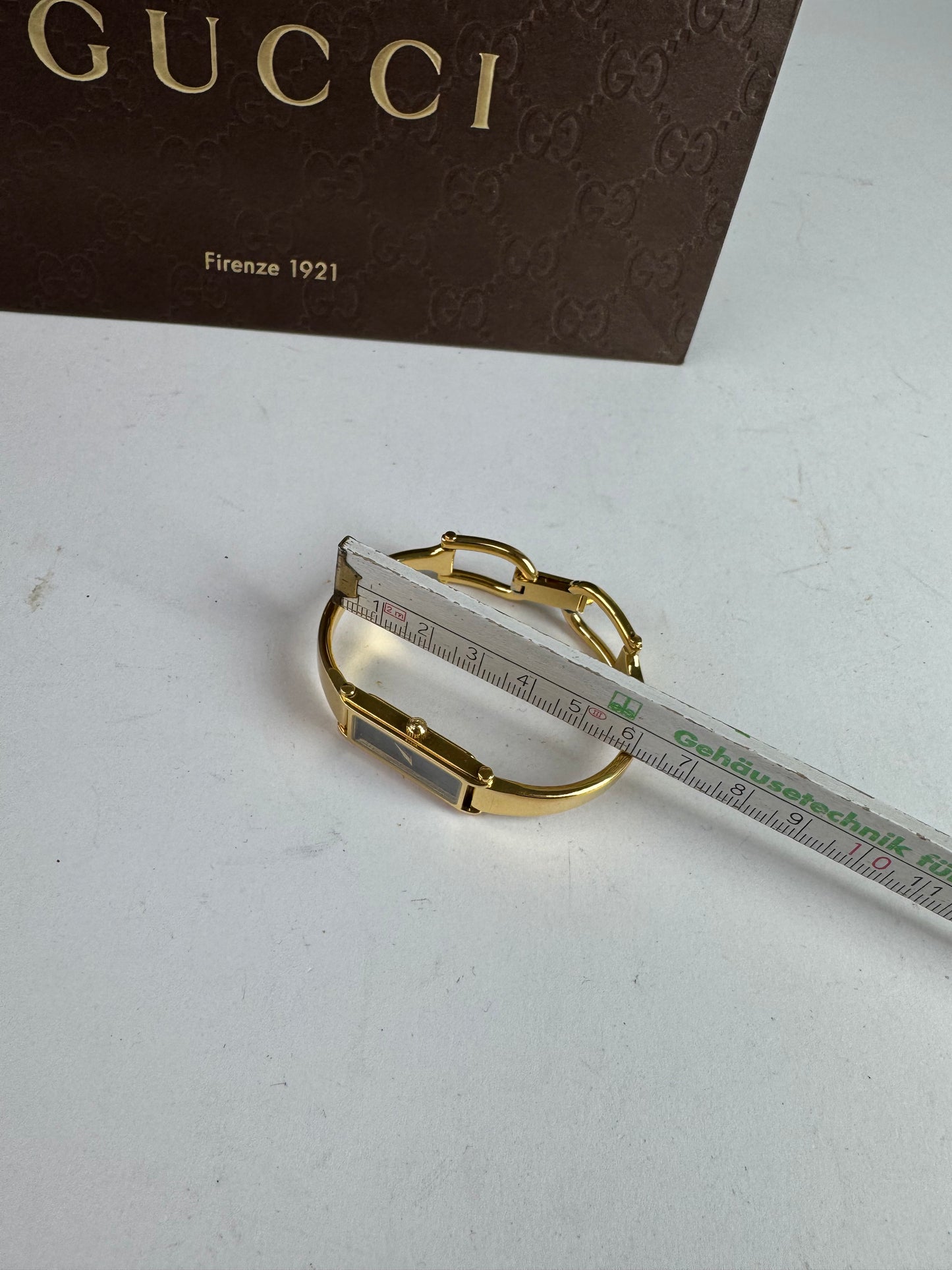 Montre Gucci vintage à mors en or