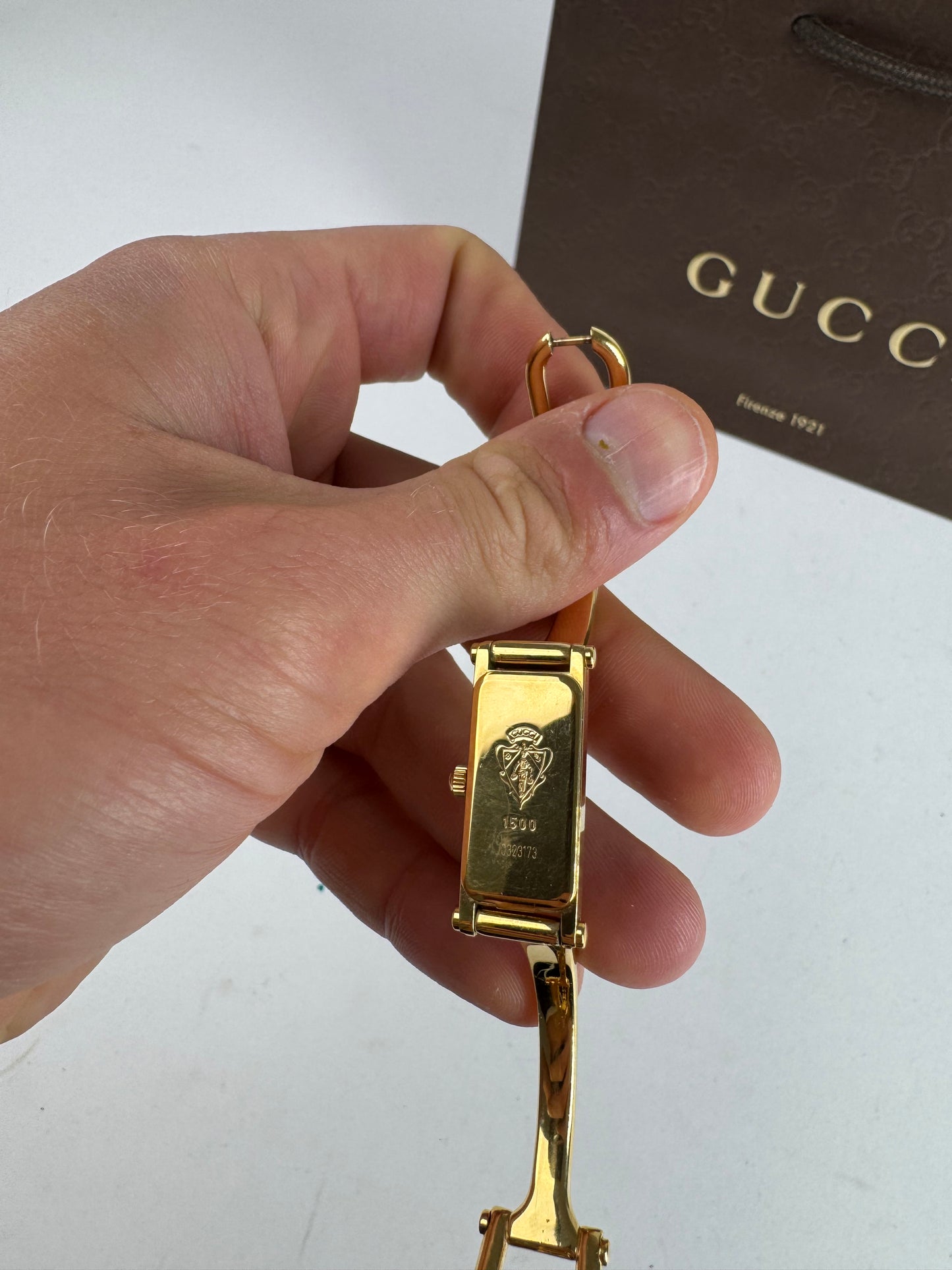 Montre Gucci vintage à mors en or