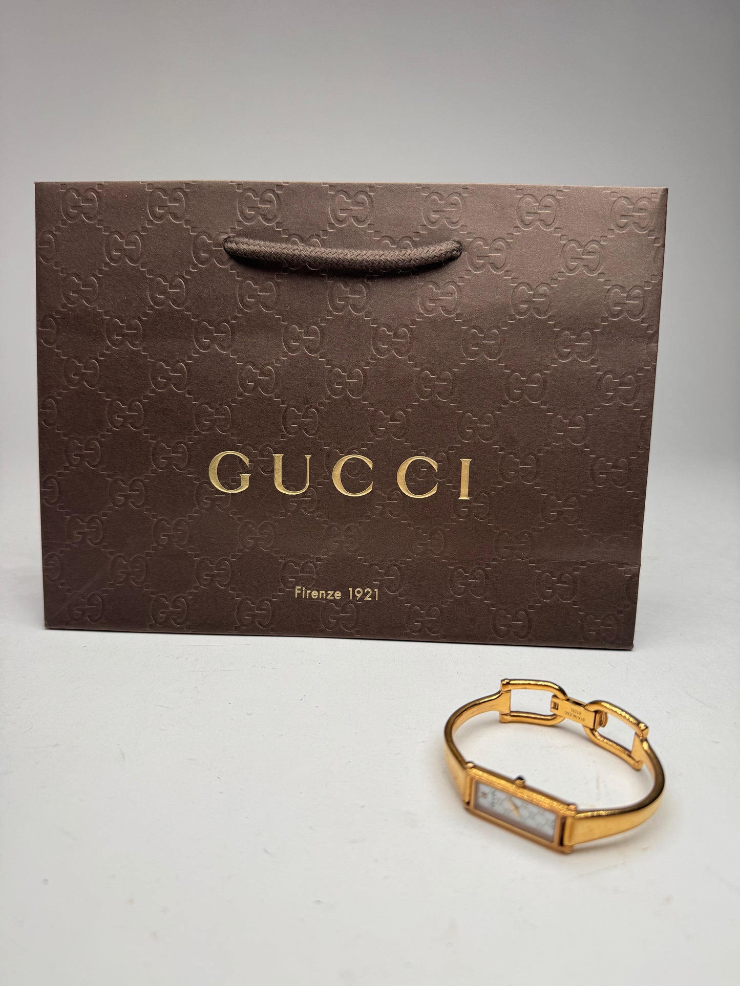 Montre Gucci vintage à mors en or