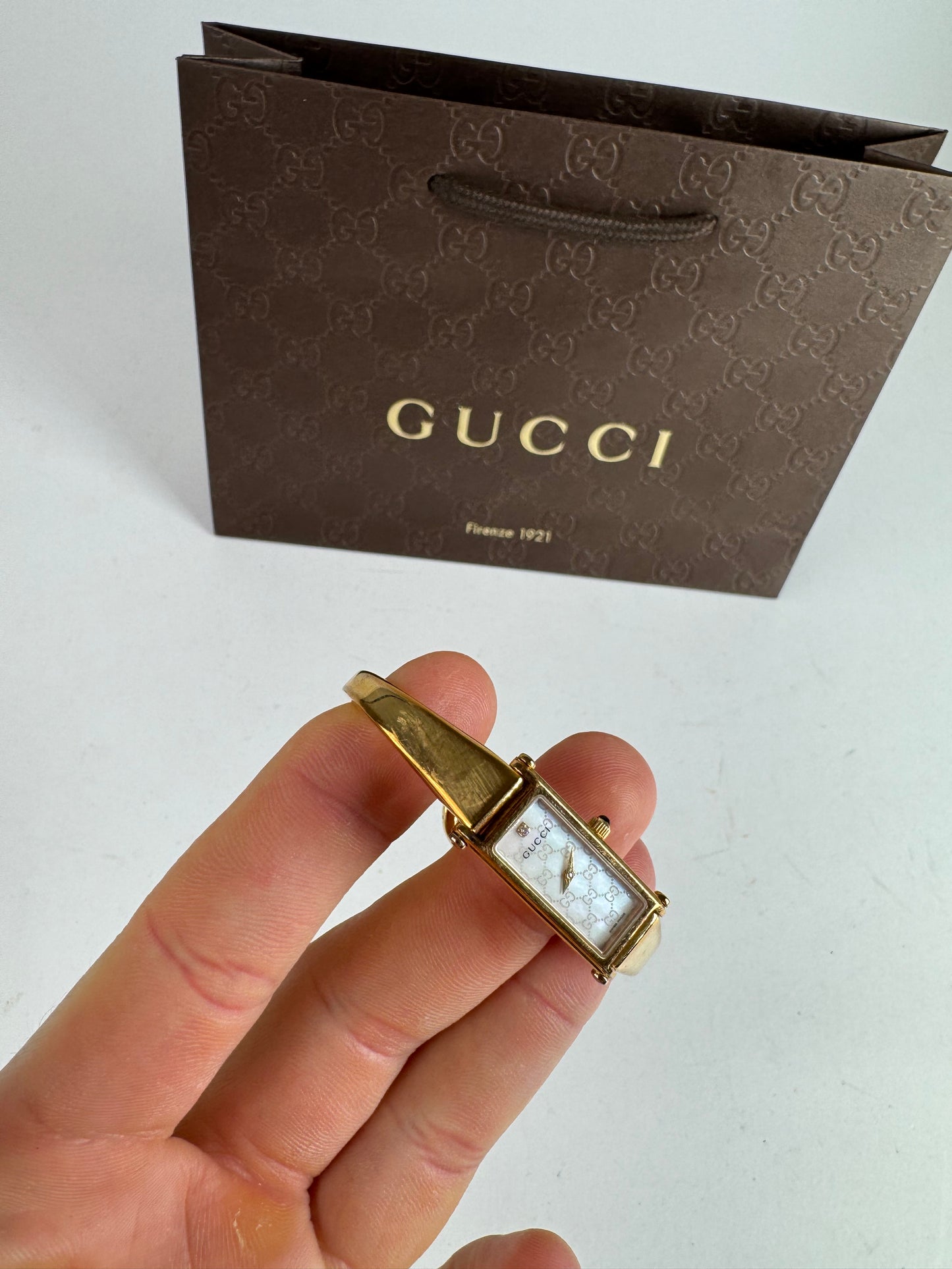 Montre Gucci vintage à mors en or