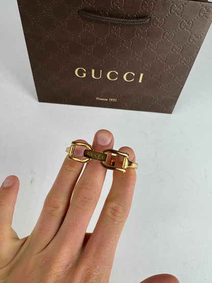 Montre Gucci vintage à mors en or