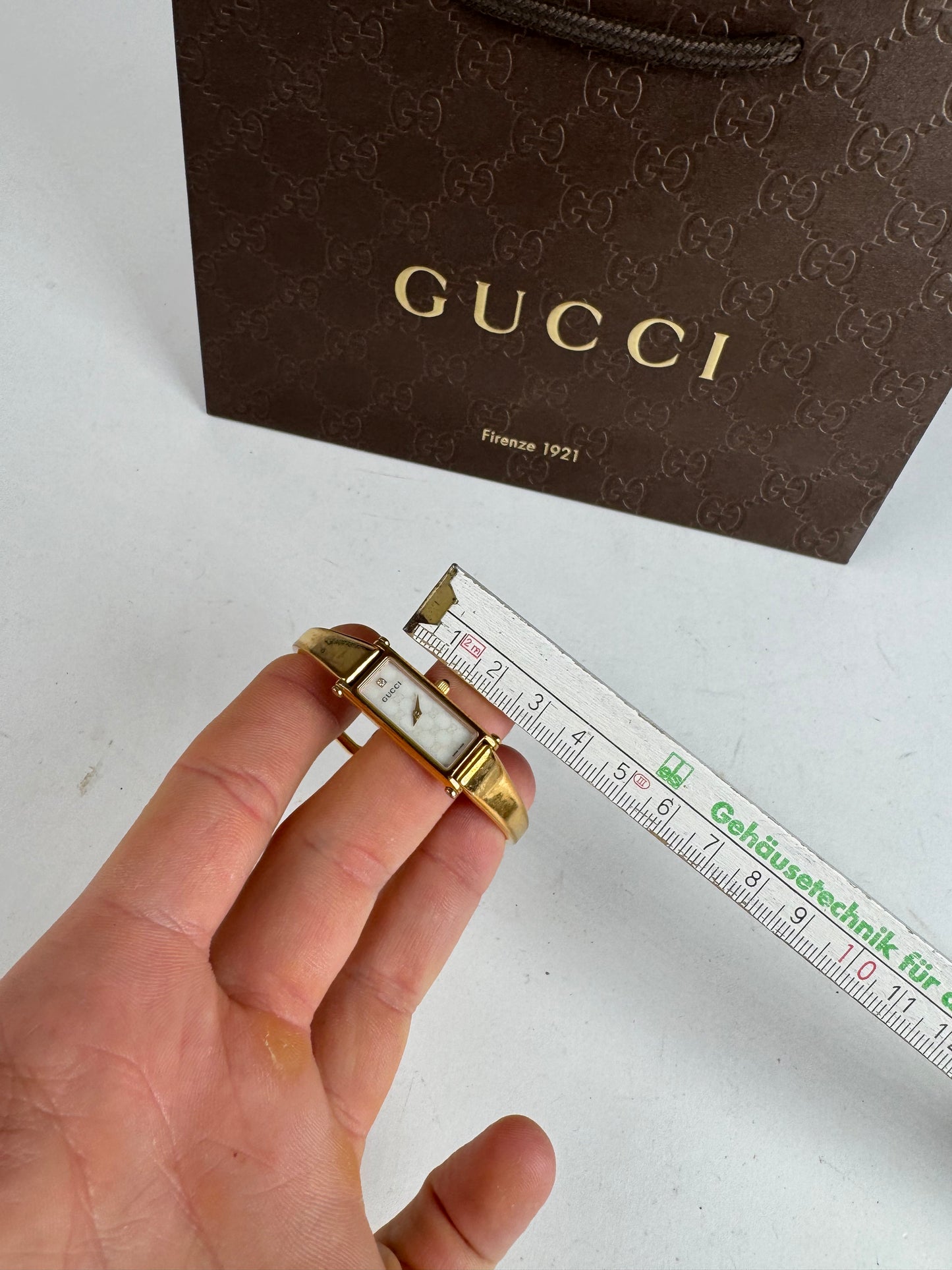 Montre Gucci vintage à mors en or