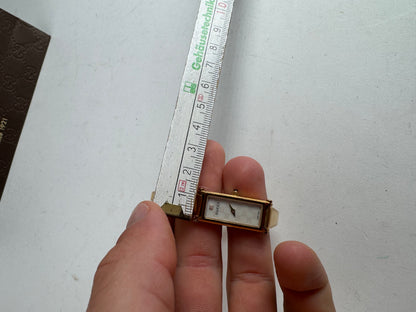 Montre Gucci vintage à mors en or