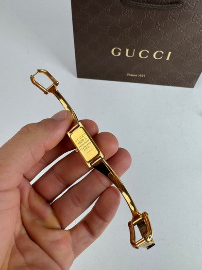Montre Gucci vintage à mors en or