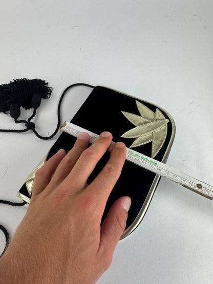 Sac vintage en velours noir Yves Saint Laurent