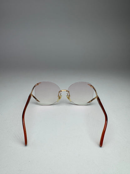 Vintage Framless Dior sunglasses purple