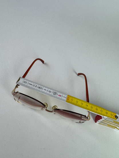 Vintage Framless Dior sunglasses purple