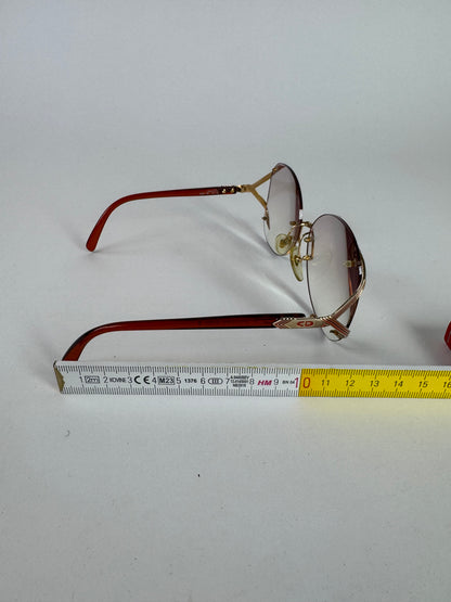Vintage Framless Dior sunglasses purple