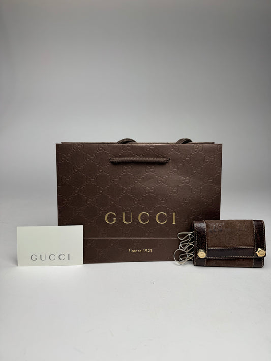 Porte-clés vintage Gucci en cuir suédé et monogramme marron