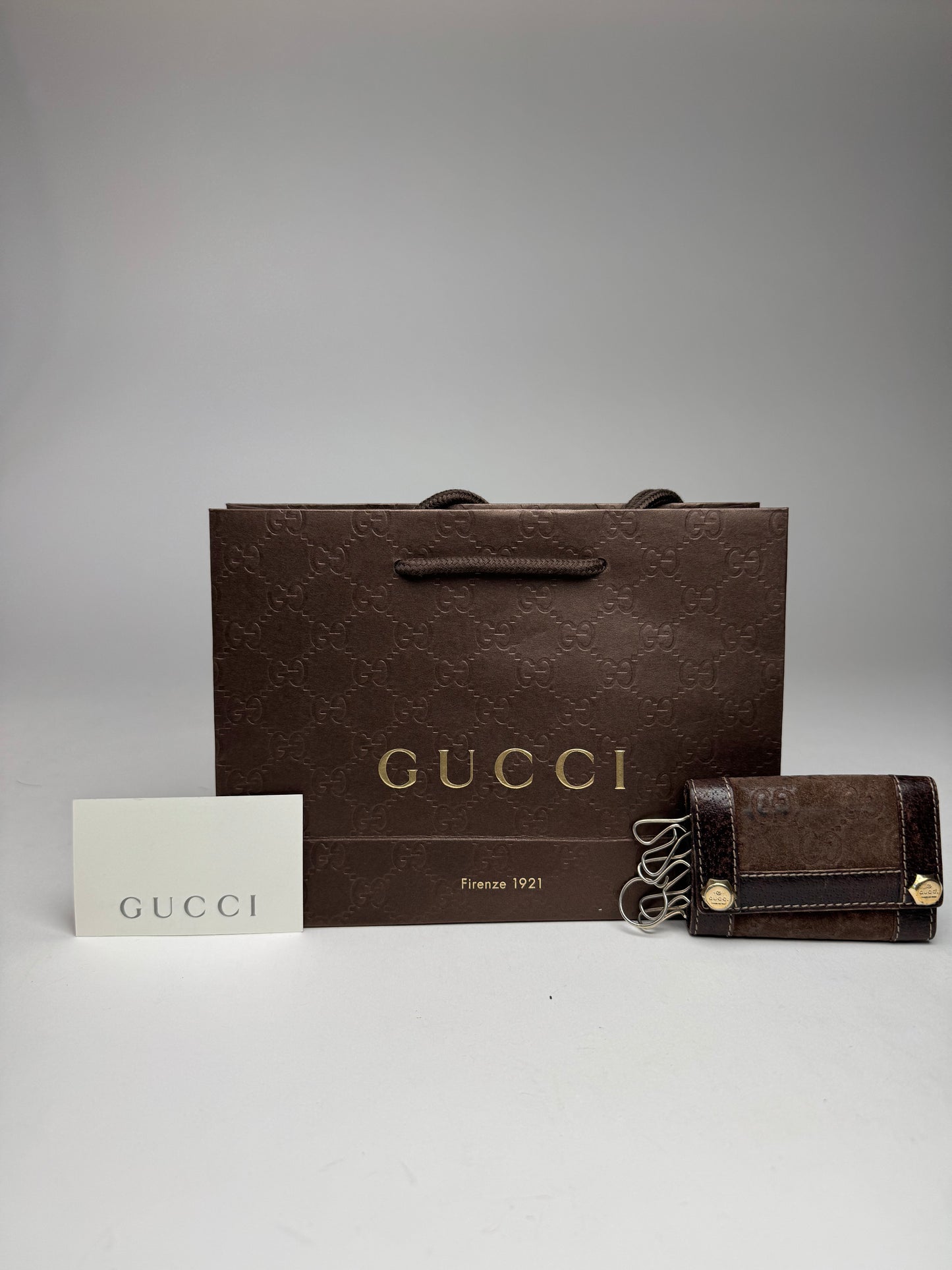 Porte-clés vintage Gucci en cuir suédé et monogramme marron