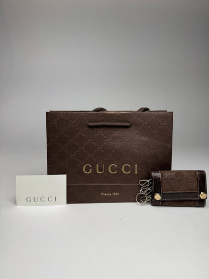 Porte-clés vintage Gucci en cuir suédé et monogramme marron
