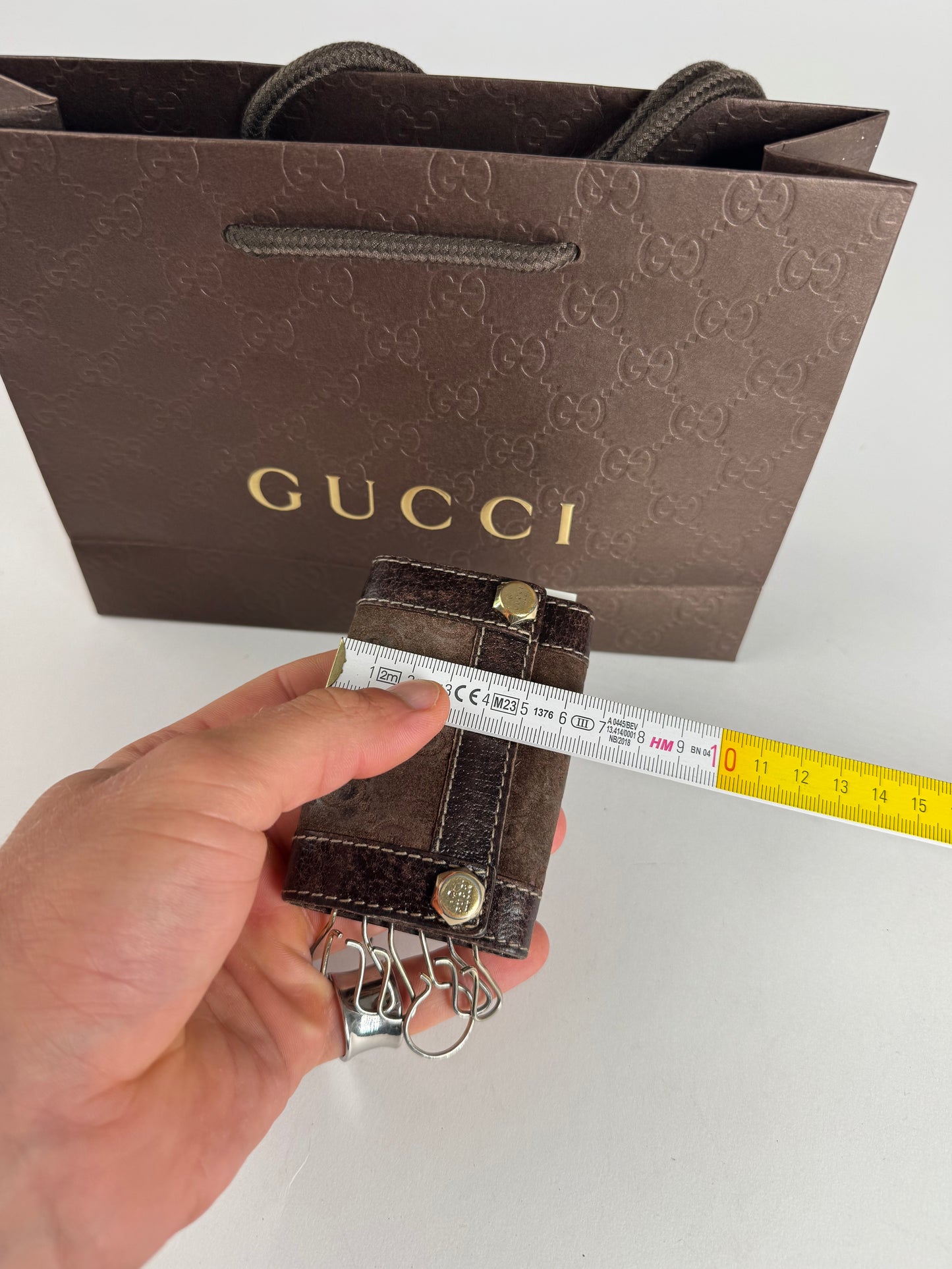 Porte-clés vintage Gucci en cuir suédé et monogramme marron