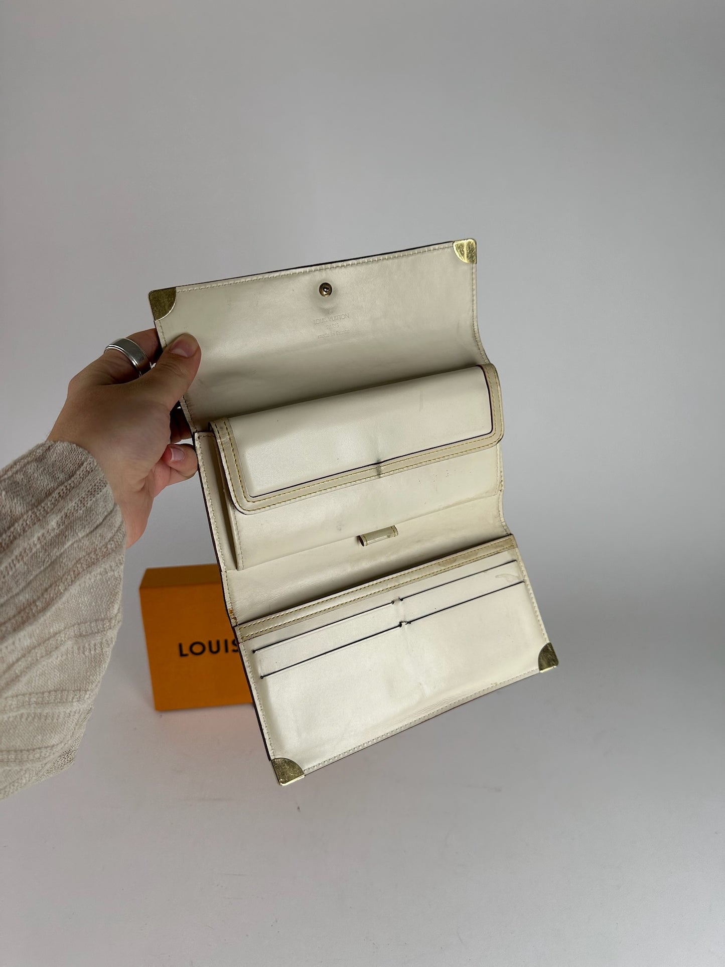 Vintage Louis Vuitton leather wallet white