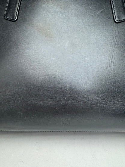 Sac vintage en cuir noir Issey Miyake