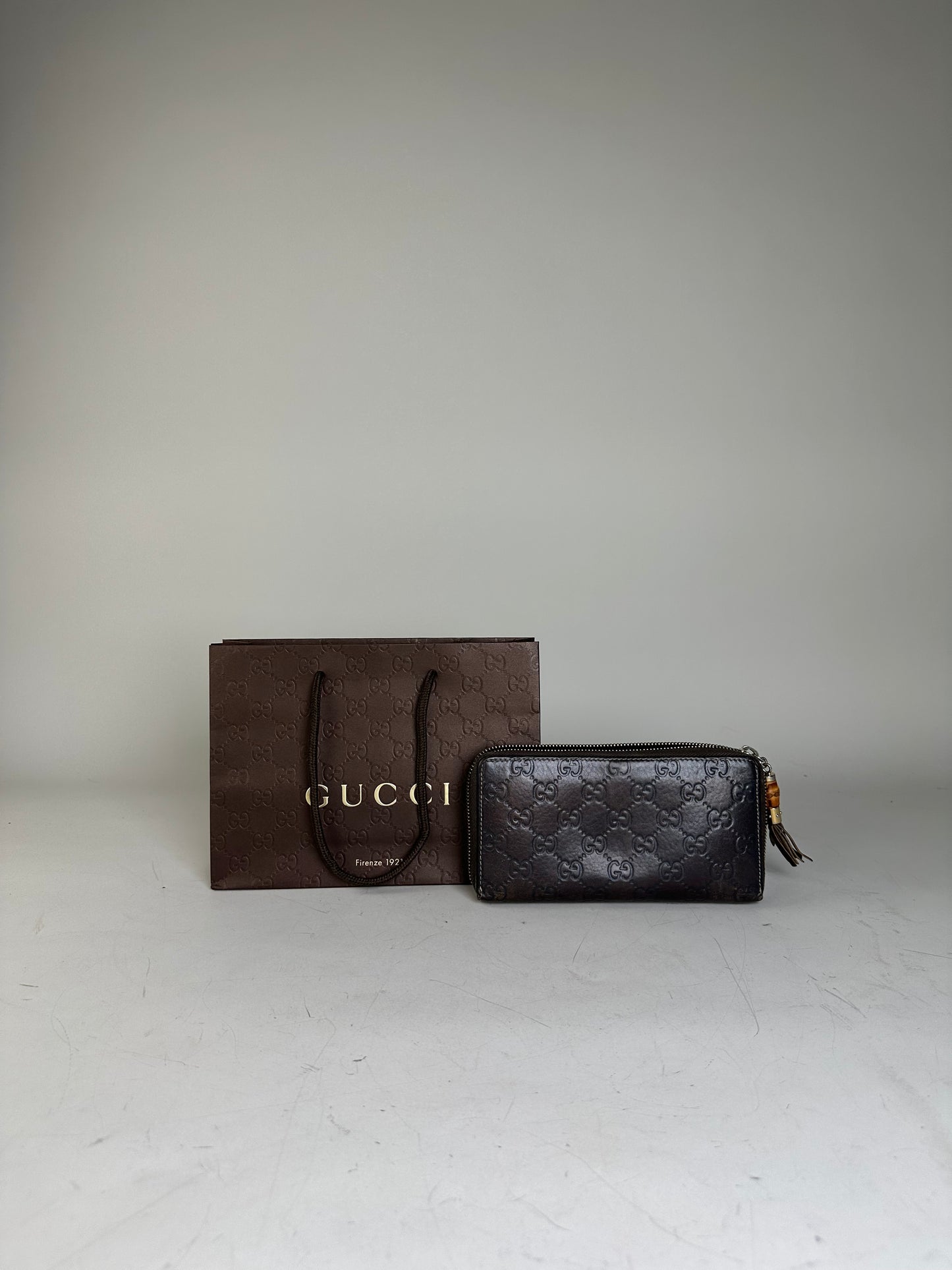 Vintage Gucci GG Embossed Leather Zip Wallet Dark Brown Gold